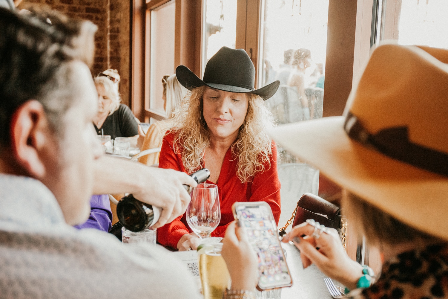 Woman in cowboy hat at Provender Hall